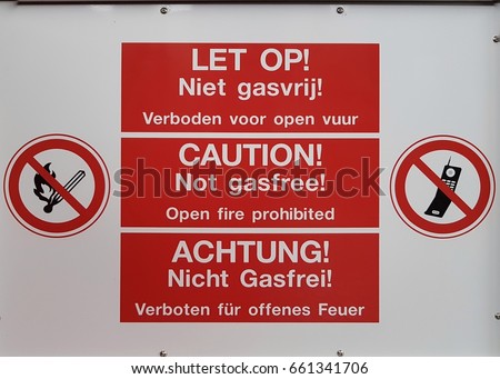 safety sign in different languages Dutch German English, safety sing prohibited open fire and use mobile phone 