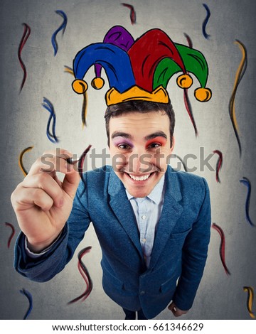 Closeup of a smiling businessman as clown drowning himself a jester, harlequin hat. Human expression and emotions, comic style, leisure and fun.