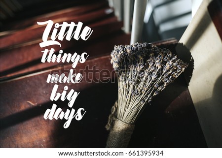 Isolated calligraphy on lavender flowers on brown background. Quote about wild quote. Little things make big days.