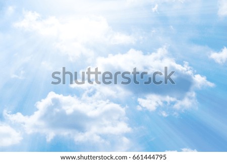 The rightness of the blue sky in sunshine day with sun-ray and cloud cumulus perfect for outdoor activity.