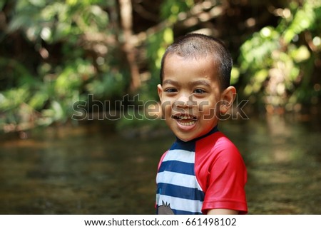 Asian little boy happy