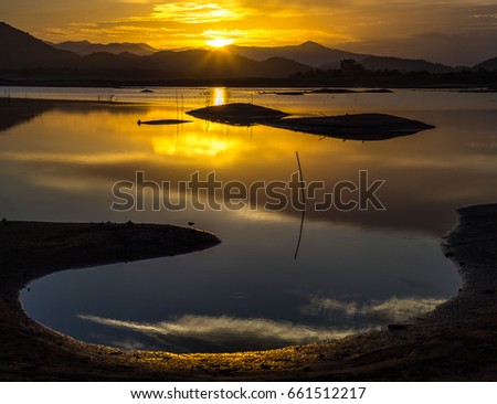A beautiful sunset over the lake  / soft focus picture 