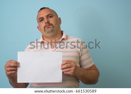 Man with a piece of paper