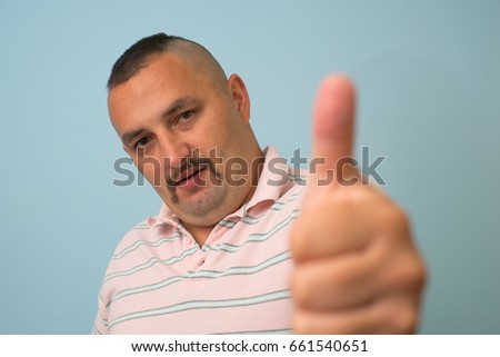 Man Showing Thumb Up