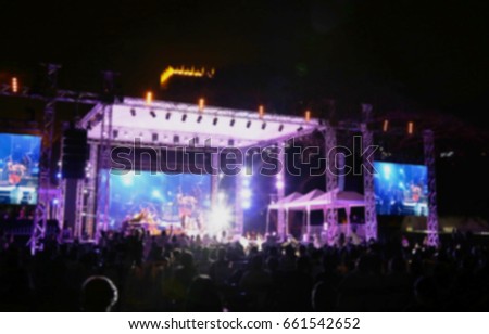 Blurred picture of outdoor concert with beautiful light