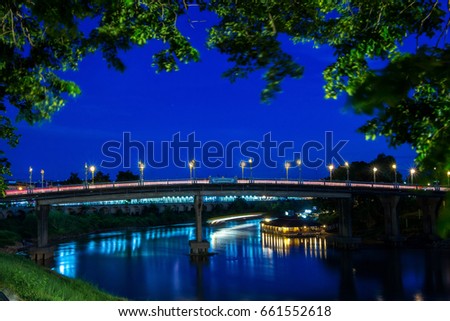 The color of the lights on the bridge (Eka Thot Sa Root Bridge) in Phitsanulok, Thailand.