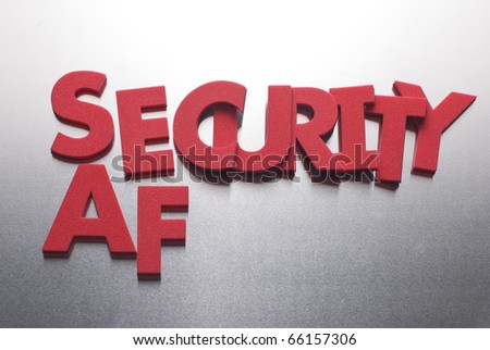 security and safe word on metal background, part of a series of business words