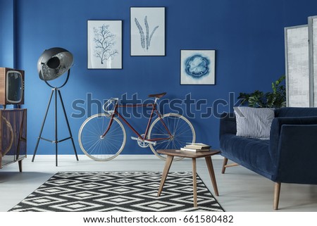 Vintage bike in stylish retro living room