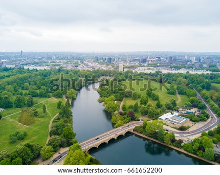Aerial Hyde park view in London from above. Beautiful nature in the middle of the city. Royalty-Free Stock Photo #661652200