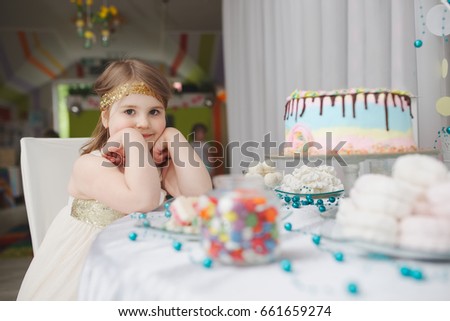girl with birthday cake at home