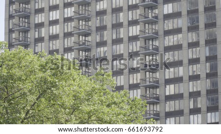 Wide shot - Typical New York City housing complex day exterior establishing photo DX. Apartment project balcony view