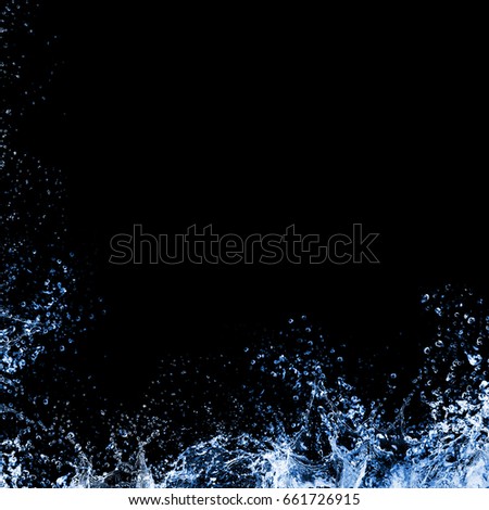 splash of juice isolated on black background. beautiful splash of blue wine close-up. blue water splash. oil splash. water spray with drops isolated.