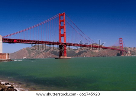 Golden Gate Bridge and clear blue sky in the background, San Francisco