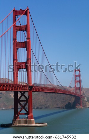 Golden Gate Bridge and clear blue sky in the background, San Francisco