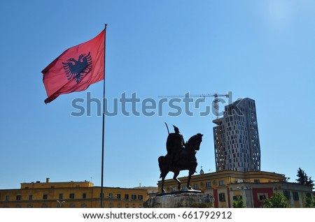 Statue of George Castriot (Skanderbeg) and the national flag of Albania, Tirana, Albania 