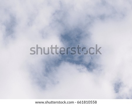 high white clouds in winter with clear light blue sky on a sunny day for use as backdrop background picture