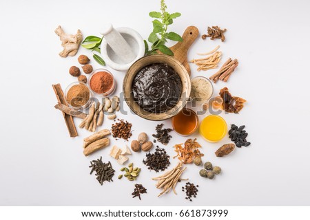Ayurvedic Chyavanprash or Chyawanprash is a Powerful  Immunity Booster OR Natural Health Supplement. Served in an Antique bowl with Ingredients, over moody background, selective focus Royalty-Free Stock Photo #661873999