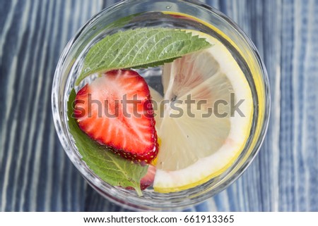 Detox water with strawberries and lemon. Health and body cleansing.
