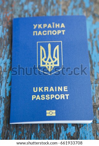 New biometric passport for Ukrainian citizens makes travelling to Europe easy.Modern electronic passport id card with bio information including fingerprints & photo