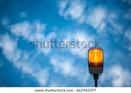 street light with blue sky in background