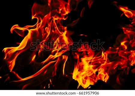 Fire Flame Texture With Motion Blur Effect Over Black Background