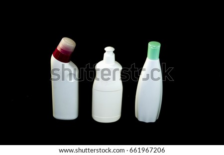 plastic bottles against dark background 