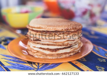 Pancakes on a plate, vibrant picture