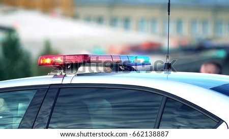 Police car light bar in action, telephoto lens shot