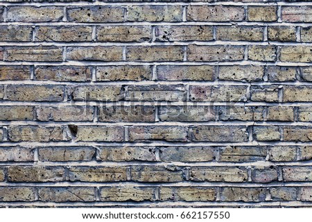 Old grunge blue brick texture background with cracks