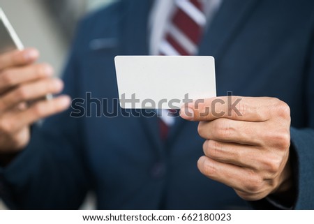 business man hold card