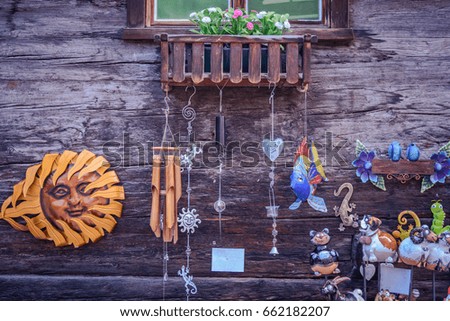 Various decorations hanging on a window in Zermatt, Switzerland.