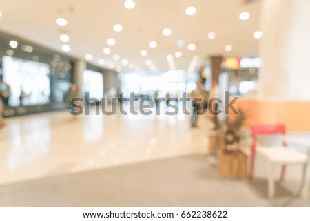 abstract blur retail store in luxury shopping mall for background