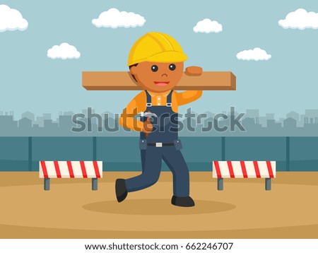 african worker carrying block of wood