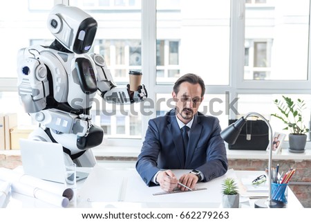 Courteous android is giving espresso for businessman
