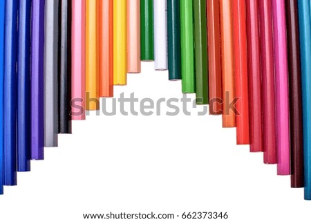 Many colored pencils isolated on white background, place for text.