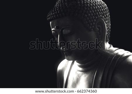 asian buddha on black for background with copy space.