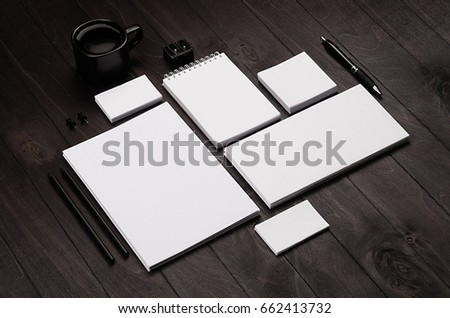 Blank corporate stationery on black stylish wood background. Branding mock up for branding, graphic designers presentations and business portfolios.
