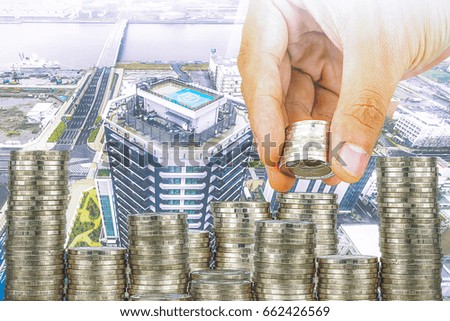 Exposure of Finance and Saving money banking concept,Hope of investor concept,Male hand putting money coin like stack growing business. background the city 