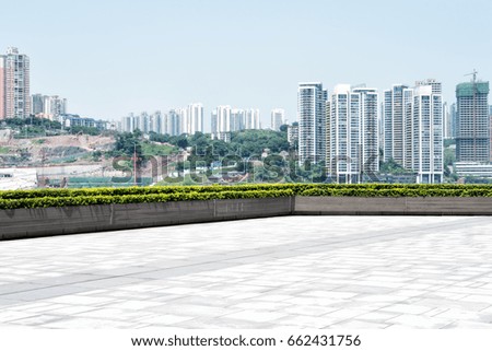 empty floor by river with cityscape of chongqing