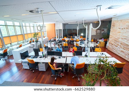 Startup business people group working everyday job at modern coworking  office space Royalty-Free Stock Photo #662529880