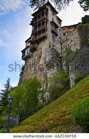 A house hanging on the rock