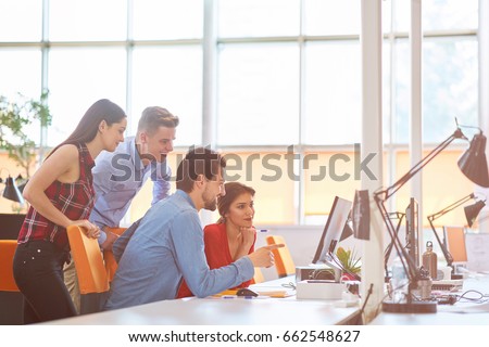 Startup business people group working everyday job at modern coworking  office space Royalty-Free Stock Photo #662548627