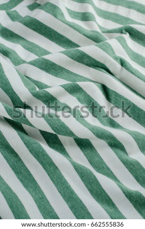 Texture of Green Striped Fabric.