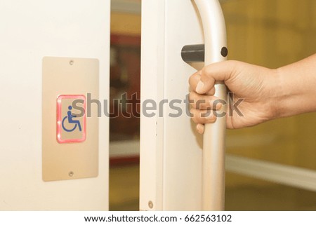 Door handles lift for the disabled