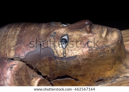 egyptian queen stone painted ancient sarcophagus close up detail