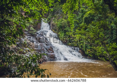 Beautiful cascading Datanla waterfall In the mountain town Dalat, Vietnam.