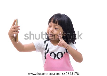little girl shoot selfie with a smartphone isolated on white background
