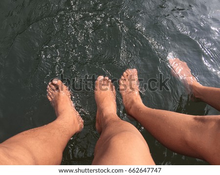 Feet in the water.
