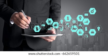 business man using digital tablet and icon of media screen concept