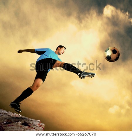 Footballer on the top of mountain